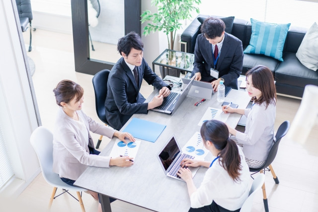 japanese office workers having a meeting