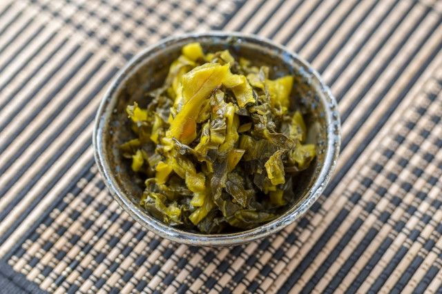 A side dish of pickled takana.