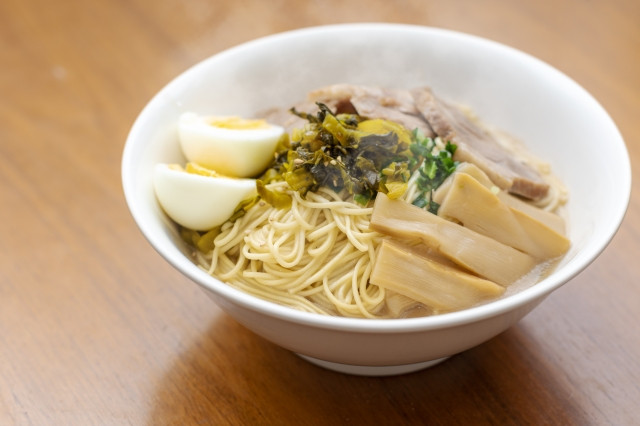 A bowl of ramen topped with Takana.