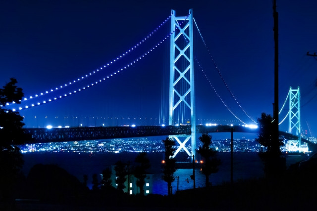 Brightly lit Akashi Kaikyo Bridge at night
