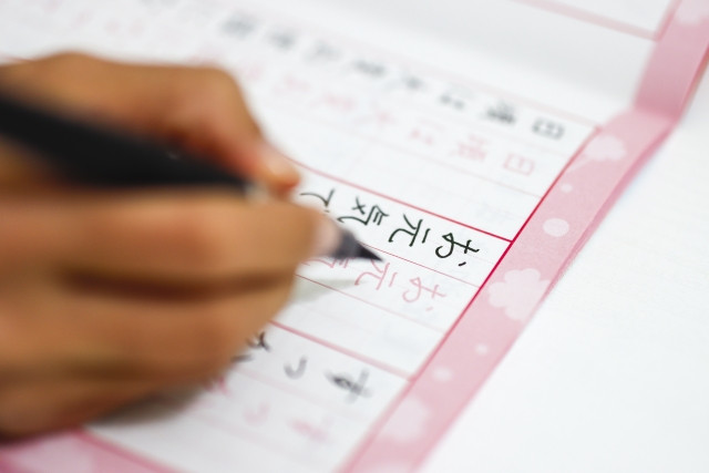 Calligraphy practice book and ink pen