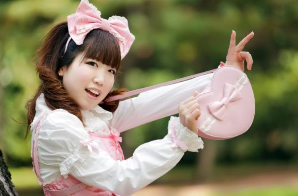Sweet Lolita Japanese girl with big ribbon headpiece